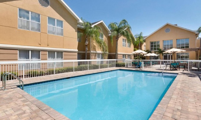 Feather Sound Hotel | Perfect Spot for Unwinding! Outdoor Pool, Free Breakfast, Full Kitchen!