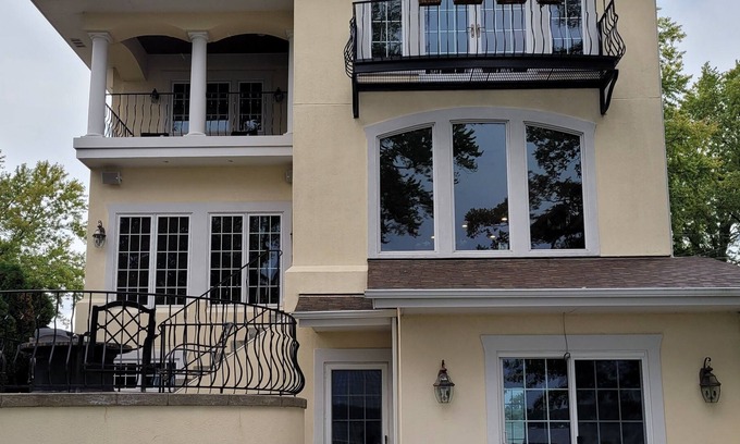 Pewaukee Villa | Pewaukee Lake villa with two outdoor patios and a gourmet kitchen.