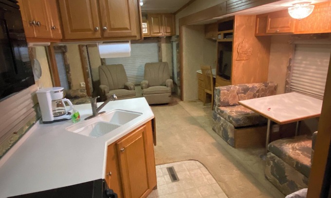 Benzonia House | Platte - 37ft RV Camper in the Woods with Fire pit & Hot Tub Access