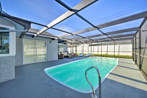 Orchid Lake Village House | Port Richey Getaway with Lanai, Pool and Grill!