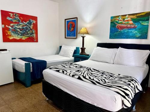 Coroa Grande House | Pousada Dodô