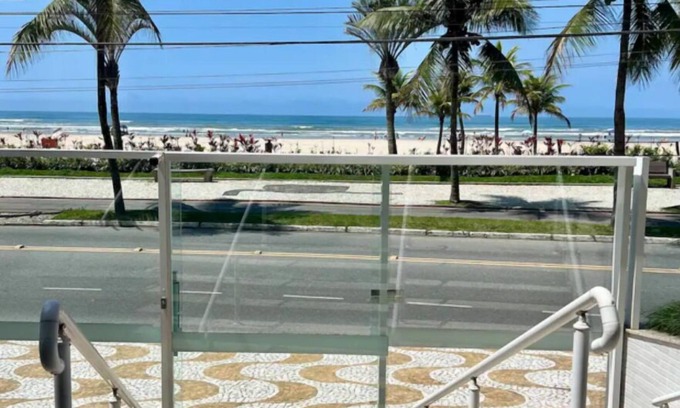 Praia Grande Apartment | Praia Grande Paradise! Feet in the sand! Facing the Sea.