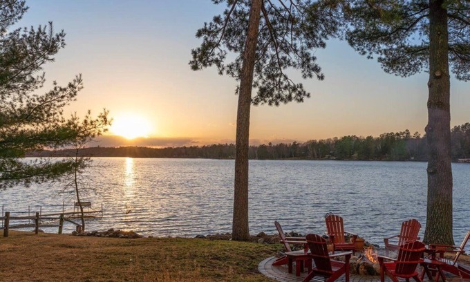 Emily House | Pristine home with sandy beach, firepit, dock and pontoon. ATV trails nearby.