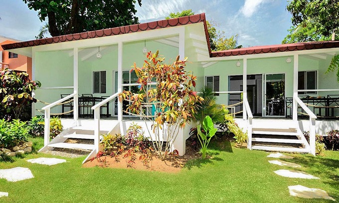 Urbanizacion Tavarez House | Private bungalow in large tropical garden with pool, steps from shops/beaches!