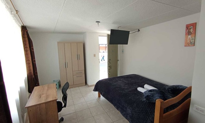 Calle 26 Hotel | Private room with WiFi, Bogotá close to El Dorado Airport