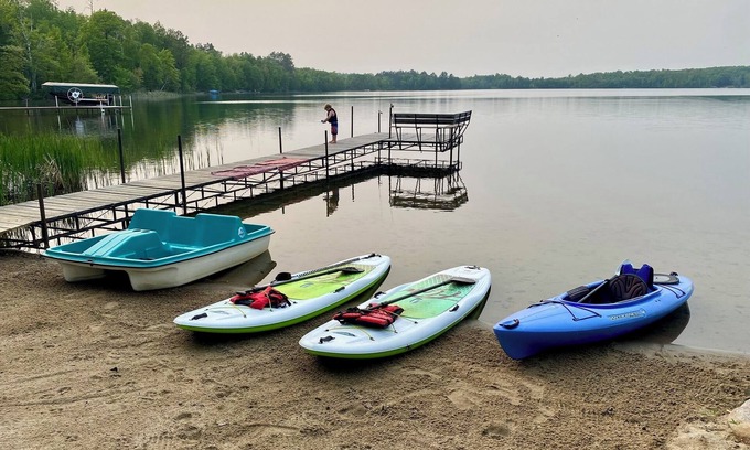 Grand Rapids House | Private sand beach, screen porch, spacious rooms, paddle boards and more!