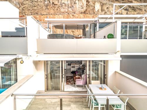 Lomo Quiebre Apartment | Puerto de Mogan - Luxe Apartment with roof terrace and sea view