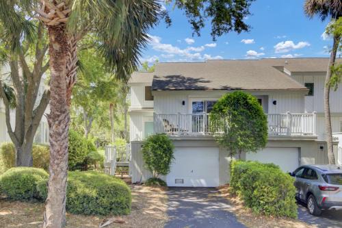 Twin Oaks House | Racquet Club 28 by Wild Dunes, in Resort Core