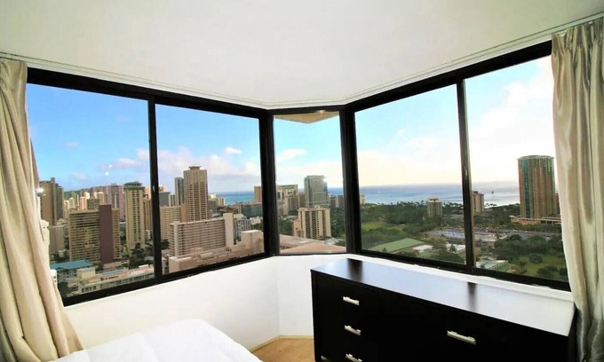 McCully - Moiliili Condo | Rare Unique Corner Unit 180 degree Ocean Canal View-34th Floor with Full Kitchen
