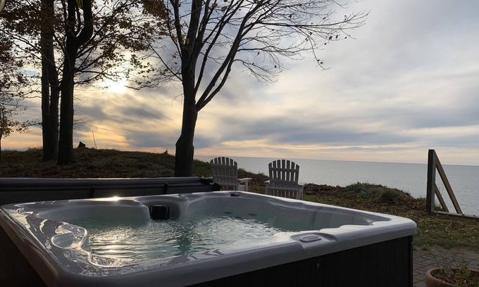 Manistee House | “Red Cottage” Manistee Lake Michigan Beach house w/new stairs to private beach