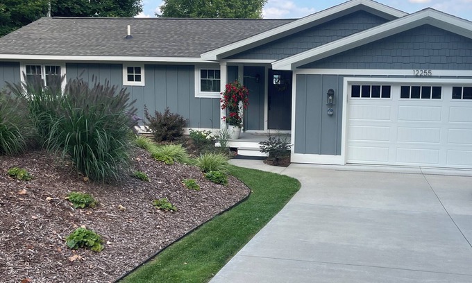 Rapid City House | Relax at our beautiful lakefront home located on the southern end of Torch Lake.