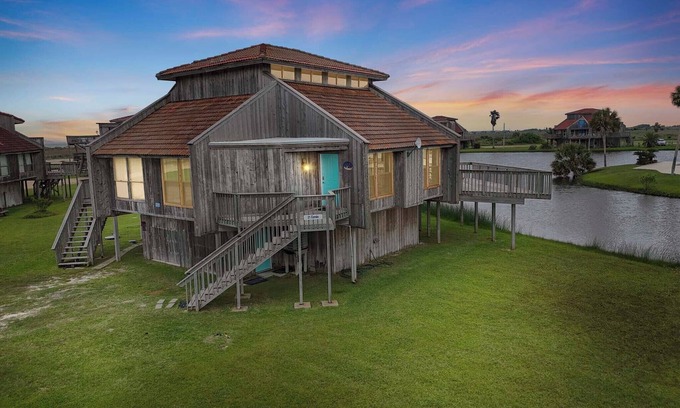 Matagorda Condo | Relax poolside with the whole family or hunt shells on the beach.