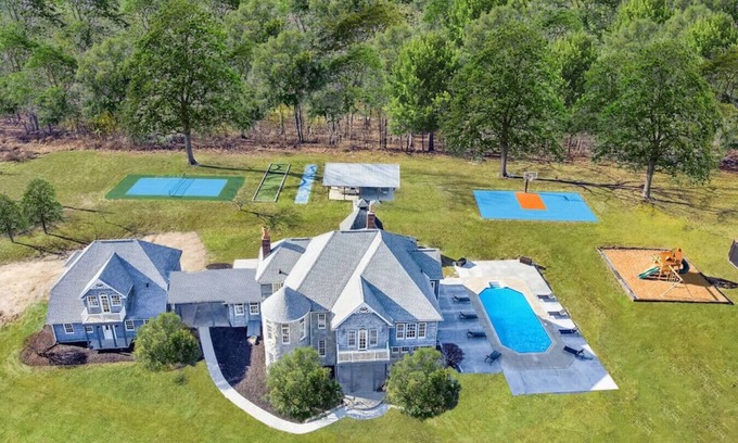 Logan House | Resort backyard | Pool | Game Room | Basketball