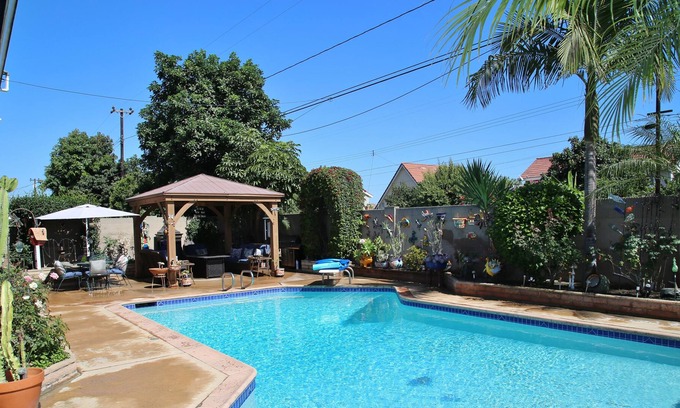 Fountain Valley House | Resort heated pool home centrally located near beach & Disneyland