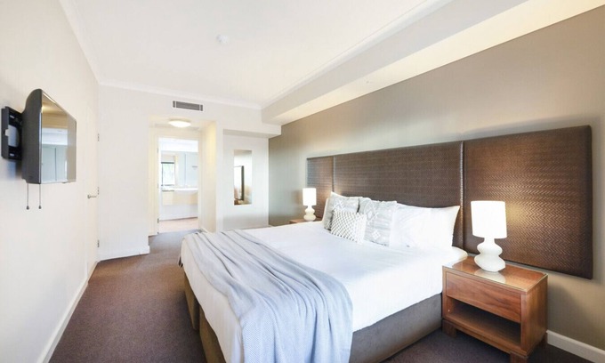 Darwin City Centre Apartment | Resort-Inspired Escape: King Bed, Pool, and Balcony