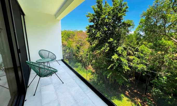 Puerto Aventuras Apartment | Resort-Style Apartment with Terrace, Pool and Nature in Puerto Aventuras