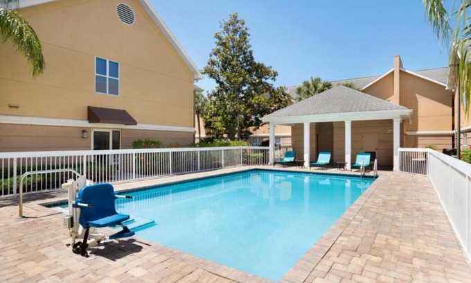 Feather Sound Hotel | Retreat to Understated Elegance! Free Breakfast, Full Kitchen, Outdoor Pool!