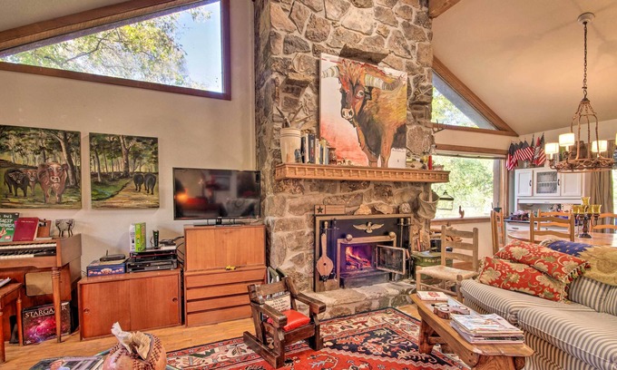 Mammoth Spring Cabin | Riverfront Getaway w/Treehouse, Fire Pit & Deck!