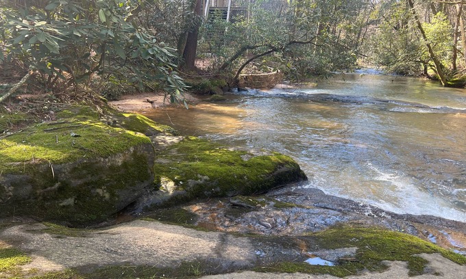 Wiley House | Riverfront hideaway with grill, game room, home theater, screened porch, & deck