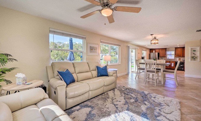 New Port Richey Cottage | Riverfront Home w/Putting Green & Boat Dock!