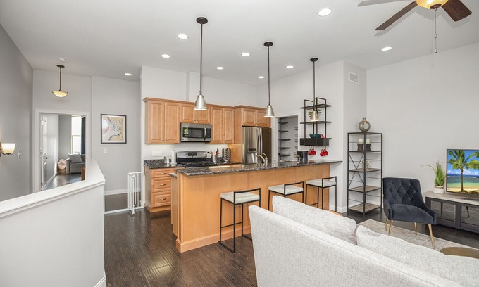 Northeast South Bend House | Riverfront Oasis: Beautiful Riverfront Townhome CLOSE to Notre Dame!