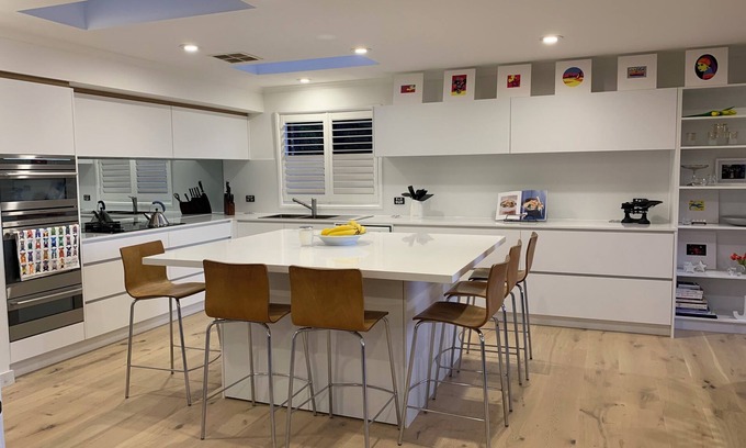 Clontarf House | Roomy Duplex with water views. Steps away from Castle Rock Beach