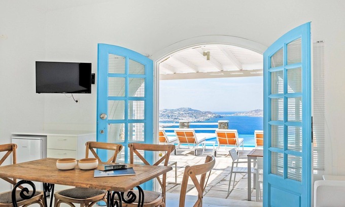 Agios Stefanos House | Rose Studio Two with shared pool and sea view