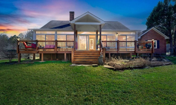 Covington House | Rustic Elegance: Farmhouse Retreat in Covington by RedAwning