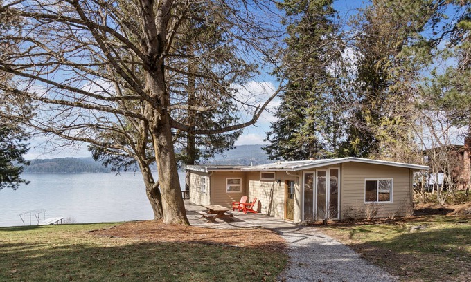 Harrison House | Rustic lakefront retreat with private beach, dock & large deck - dog-friendly