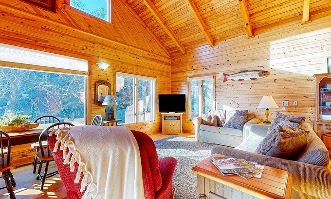 Clayton Cabin | Rustic two-story lakefront cabin near beach with dock, lake & mtn views, & deck