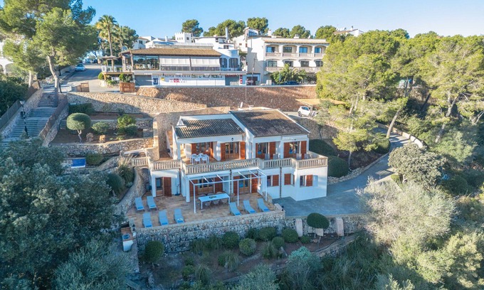 Cala Santany Apartment | Sa Trona Beach House holiday getaway with views of Cala Santanyí just steps from the beach