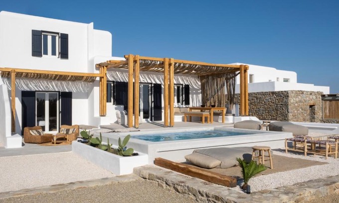 Psarou Villa | Saint L Heated Pool Sunset Villa- Three Bedrooms