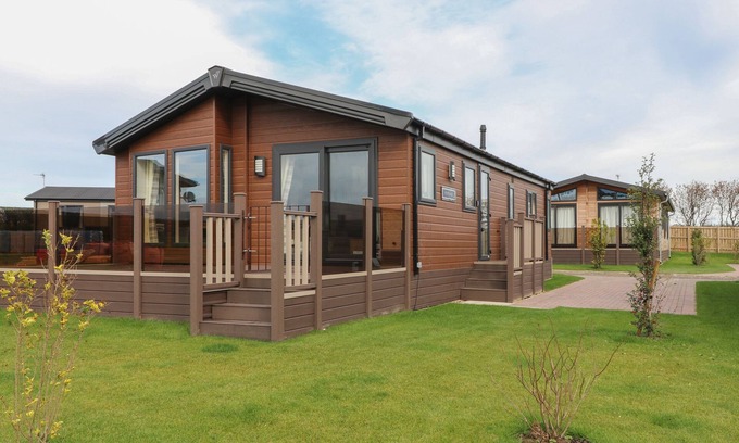 Runswick Bay Cottage | SEA HOLLY LODGE, pet friendly, with a garden in Runswick Bay