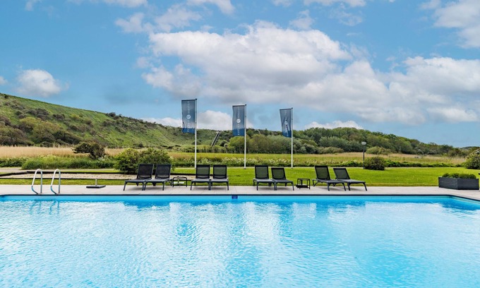 Westkapelle Hotel | Seaside Bliss with Outdoor Swimming Pool, Beach Loungers & Tennis Court Fun