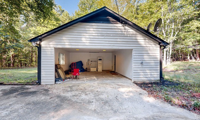 Chattahoochee Hills Cabin | Secluded dog-friendly cabin with updated interior, firepit, games, W/D, and AC