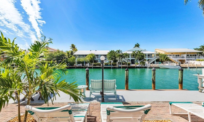 Key Colony Beach House | Seeking Paradise in the Keys? Dock for 35’ boat and pool & beach access included