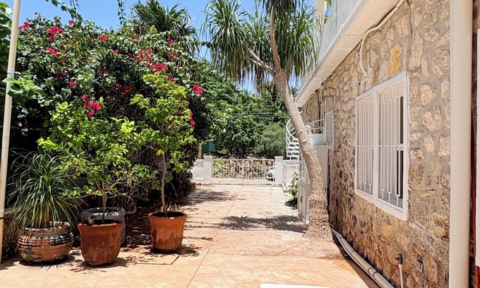 Chicxulub Puerto House | Serene 2-bedroom house with AC, pool & laundry station in Chicxulub Puerto