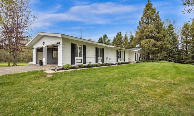 Little Suamico House | Serene Riverside Retreat by RedAwning