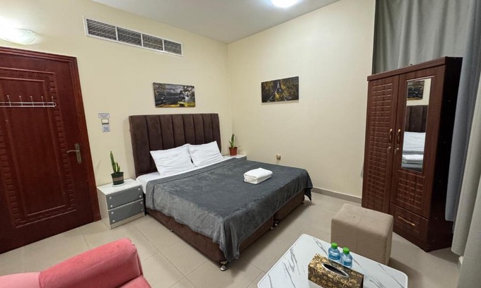 Al Ain House | Shared bath rooms only