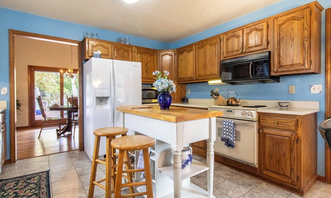 Lawrence House | Sleeps 12! Main Level Master Suite - Beautiful Backyard Oasis!