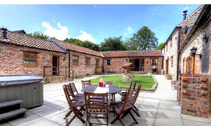 Hunmanby Cottage | Sleeps 18 complex with private pub and hot tub - Please contact us for a price!