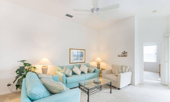 Calabay Parc Villa | South Facing Pool beside palms and grassland. Light, Spacious with Games Room ,