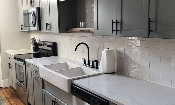 Lawrence Apartment | Spacious 3BD Loft in Heart of Downtown Lawrence. Licensed STR with parking.