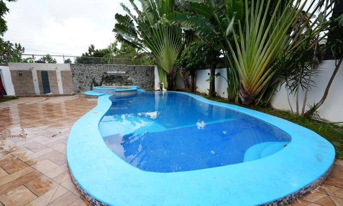 Prado Oriental Villa | Spacious 7-bedroom villa in charming Santo Domingo Este with AC, WiFi