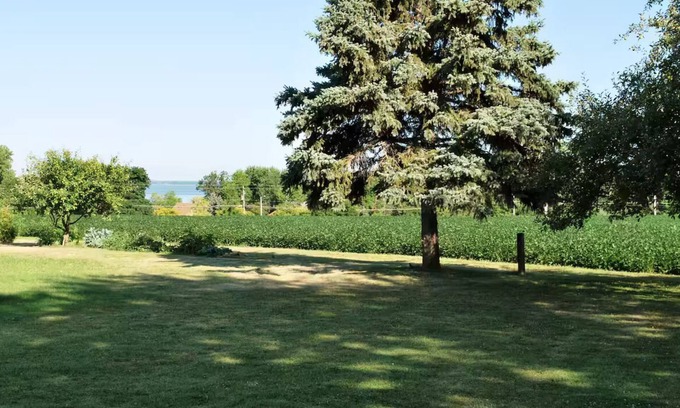 Green Bay House | Spacious "Bayview" 4-bedroom home in serene setting. Minutes to Lambeau Field.