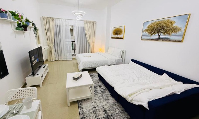 International City Apartment | Spacious Studio with balcony Trafalgar Central tower International city Dubai