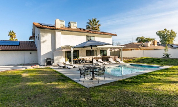 Paradise House | Spacious Vegas Retreat with Pool & Hot Tub, Near Strip & Stadiums!