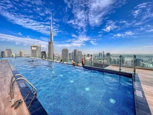 Trade Center Apartment | Spectacular Burj View from Infinity Pool