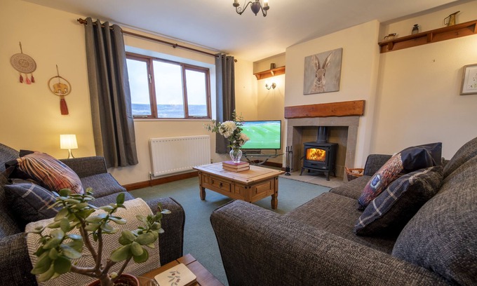 North York Moors National Park Cottage | Stable Cottage is a cosy two story Yorkshire stone cottage which sleeps five guests. Ideal for famil