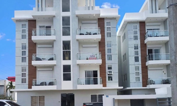 La Romana Condo | Stay at luxurious exclusive condo 10 minute walk from caleta beach